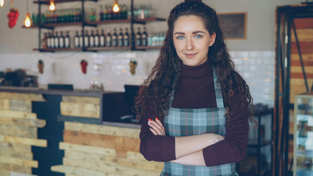 Owner standing in her coffee shop